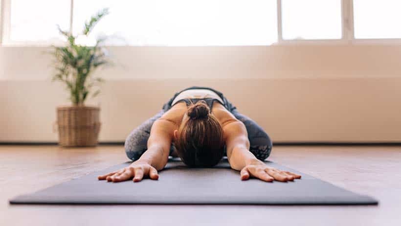 Yoga Class With Three People In Childs Pose High-Res Stock Photo - Getty  Images