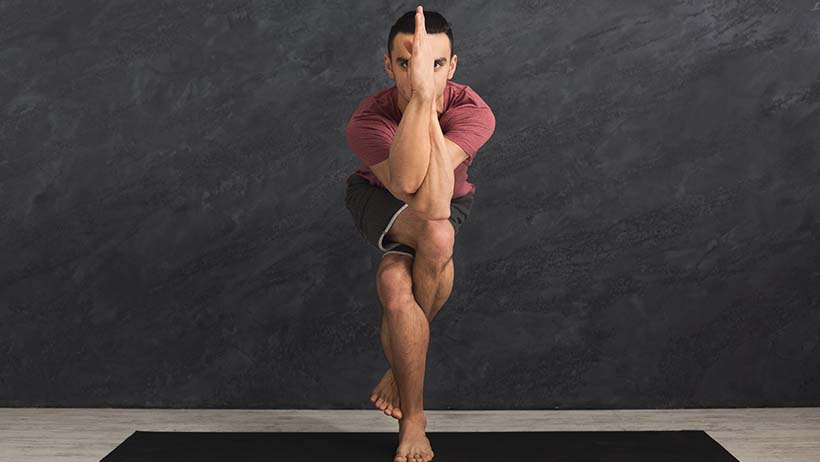 A GUIDE TO EAGLE POSE (GARUDASANA)